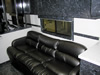 Jim Mowrey 2009 T&E 56' Tractor Pulling Semi Trailer - Interior View - Custom Lounge with Leather Sofa Units
